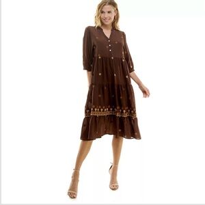 Anthropologie Fig and Flower embroidered midi dress in brown.